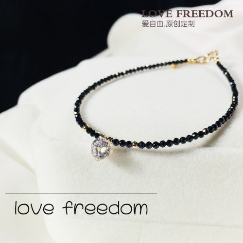Chaine de cheville Femme LOVE FREEDOM en Alliage argent plaque or - Ref 3104571