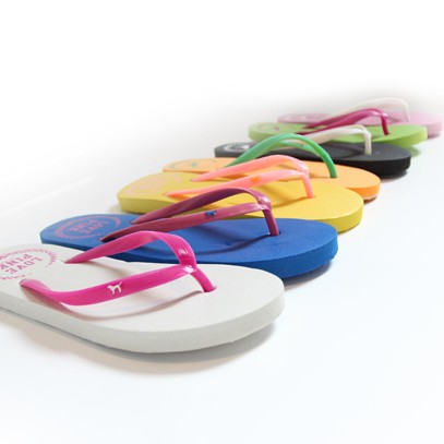 Tongs femme en plastique - semelle caoutchouc Ref 2665856